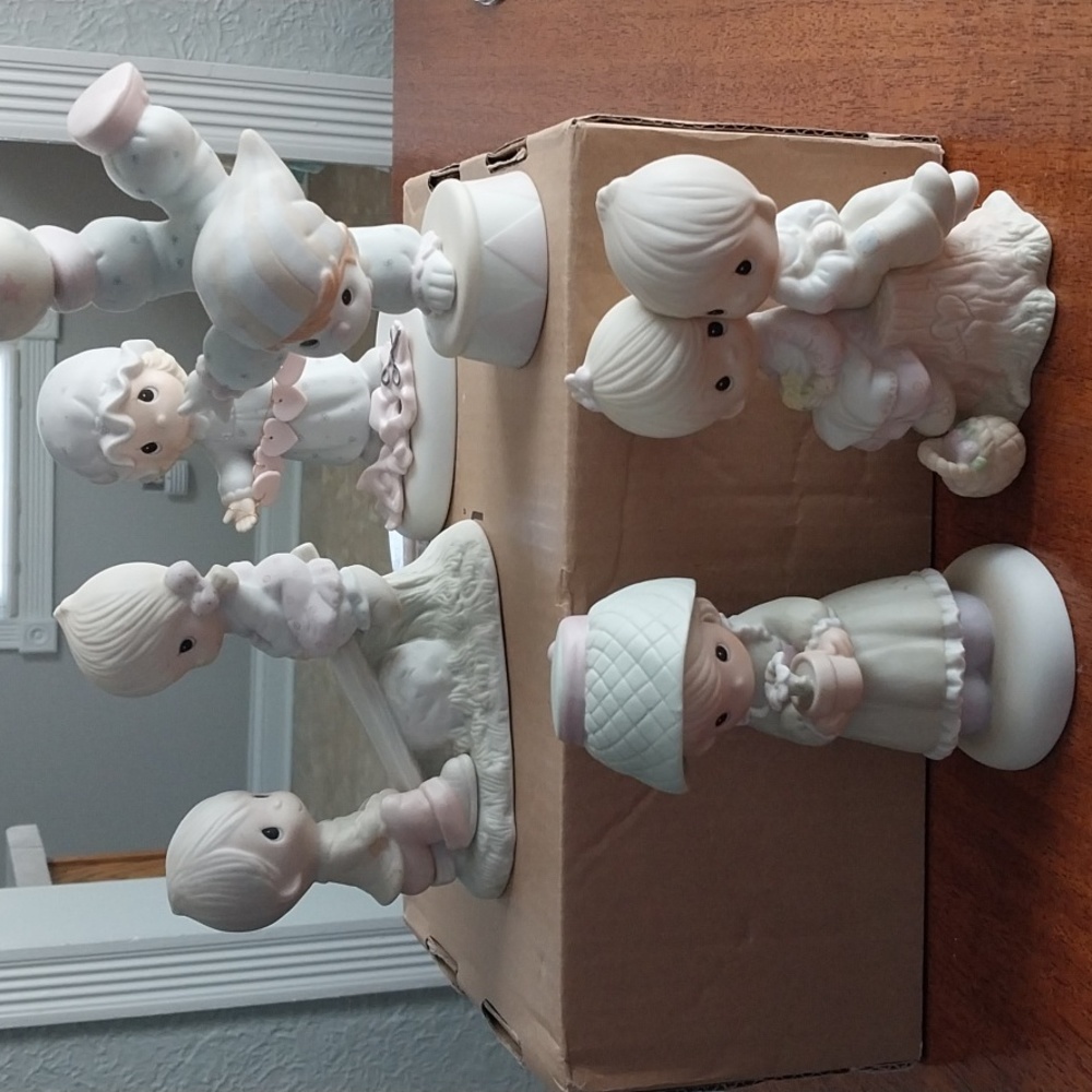 Five vintage Precious moments  figurines.